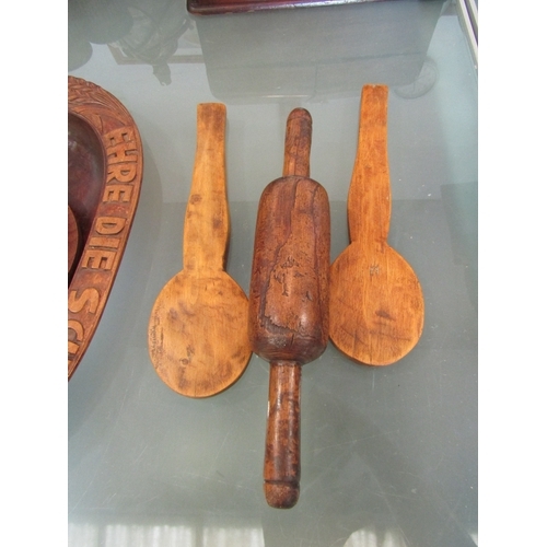 1396 - A 19th Century French hand carved rolling pin and two Scandinavian butter paddles (3)