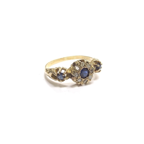 9406 - A gold ring centrally set with a sapphire framed by old cut diamonds and sapphire set shoulders, unm... 