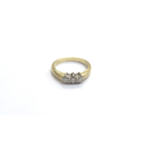 9305 - An 18ct gold three stone diamond ring 0.33ct total approx. Size L, 3.4g