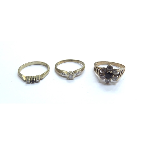 9246 - Three 9ct gold rings, one diamond, diamond and sapphire and sapphire and white stone. Sizes M, L and... 