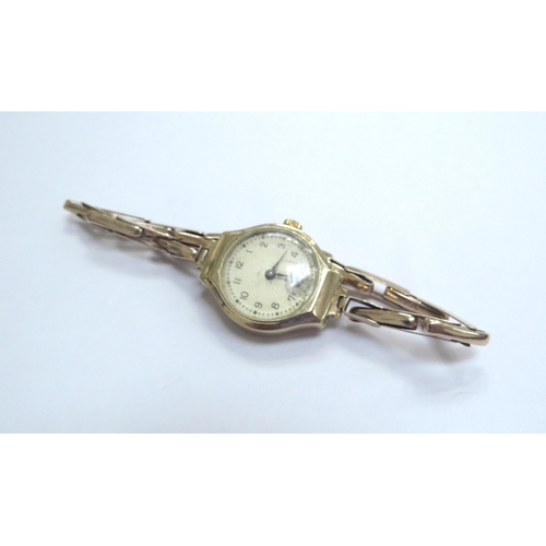 9247 - A 9ct gold wristwatch, 11.9g