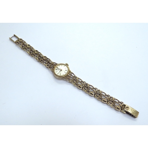 9248 - A lady's Omega 9ct gold watch with 9ct gold bracelet strap, 18.4g