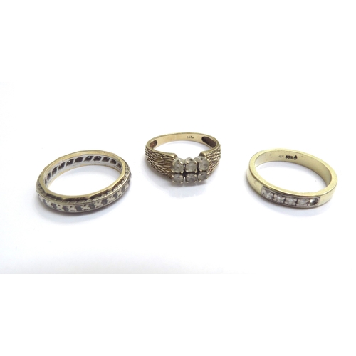 9221 - Three rings, one diamond set (one missing) stamped 585, a paste set example stamped 14k, 6.5g total ... 