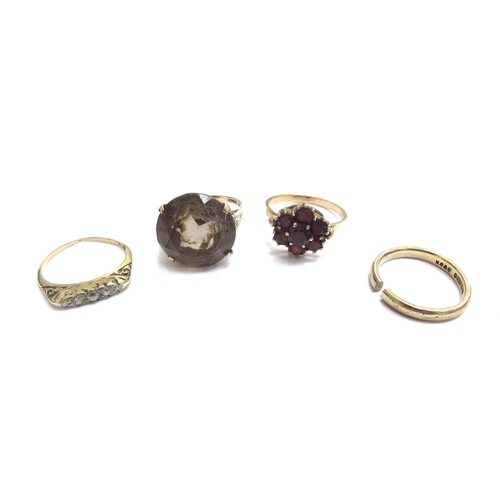 9274 - Four gold rings including three 9ct examples, smoky quartz size M, wedding band (cut), garnet cluste... 