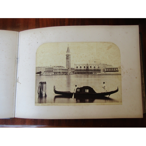 1028 - A Victorian tourist photograph album dated 1872 including Venice, Switzerland and Tenby