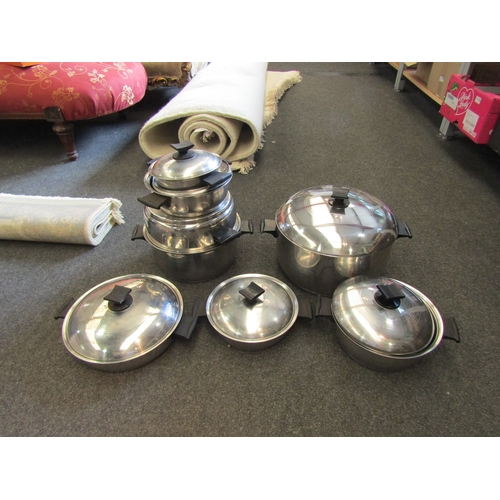 1424 - A quantity of Canadian Renaware stainless steel cooking pans including egg poacher, large pan, gradu... 