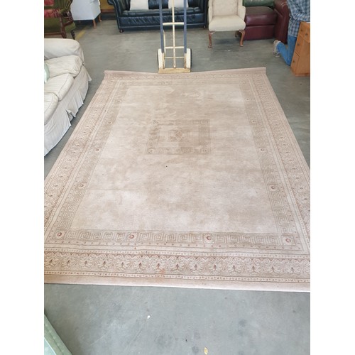 2349 - A large cream wool rug 242cm x 340cm