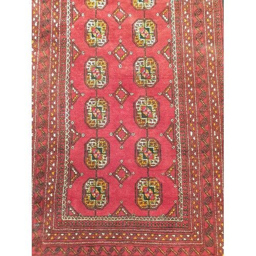 2254 - A Persian hand woven red and black runner rug, 101cm x 190cm   (R) £150