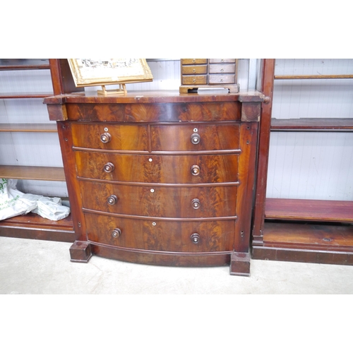 2188 - A mahogany chest of two over three drawers with hidden drawer, back panels loose