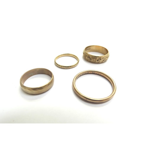 9116 - Four 9ct gold rings including engraved example, 9.9g