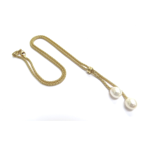 9045 - An 18ct gold necklet with two pearl drops, 40cm long, 8g