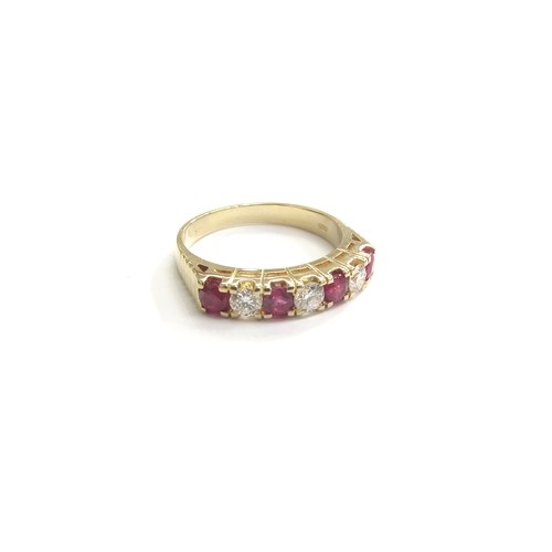 9315 - A 14ct gold diamond and ruby seven stone half hoop ring. Size P, 4.4g       (C)