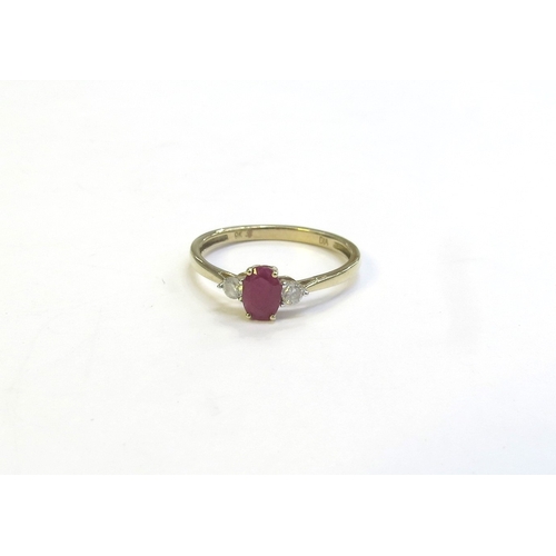 9161 - A ruby and diamond ring, the central oval ruby flanked by round cut diamonds, stamped 9k. Size O, 1.... 