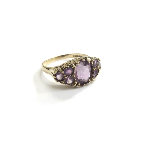 9198 - A 9ct gold multistone amethyst ring. Size Q, 3.4g   (C)