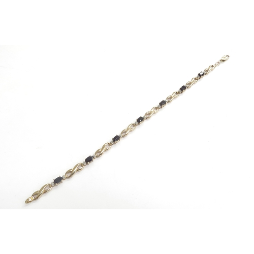 9219 - A 9ct gold sapphire and diamond bracelet, 18cm long, 6.3g   (C)