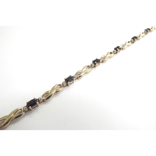 9219 - A 9ct gold sapphire and diamond bracelet, 18cm long, 6.3g   (C)