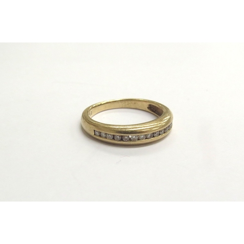 9337 - A gold diamond half eternity ring, stamped 750. Size N, 4.1g       (C)