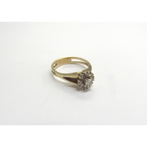 9189 - A diamond daisy ring with open shoulders, marks rubbed. Size N, 3.6g   (C)