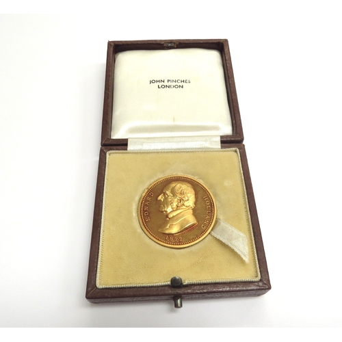 9264 - A 9ct gold Royal Agricultural College Cirencester medal Edward Holland 1872, 21.3g, cased   (C)