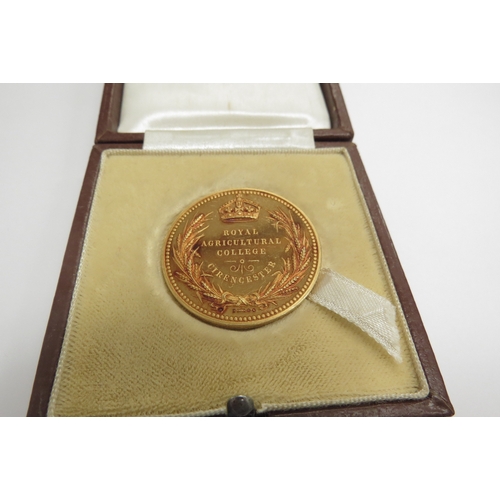 9264 - A 9ct gold Royal Agricultural College Cirencester medal Edward Holland 1872, 21.3g, cased   (C)