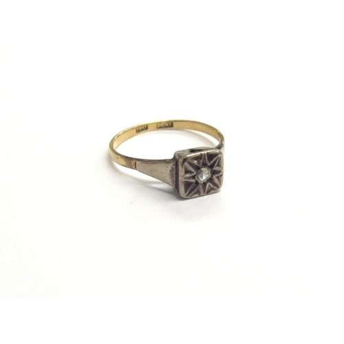 9211 - An 18ct gold platinum set ring, set with a small diamond to centre. Size M, 1.6g   (C)