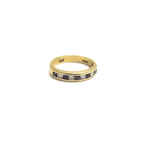 9216 - An 18ct gold sapphire and diamond half eternity ring, square cut sapphires and round cut diamonds in... 