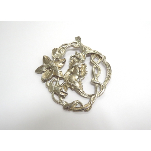 9260 - An Art Nouveau silver pendant depicting female in flower and vines, Birmingham 1901, 7.5cm x 6.7cm, ... 