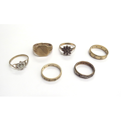 9239 - Six 9ct gold rings, including paste set daisy, signet ring (cut) and paste set eternity rings, 15.6g... 