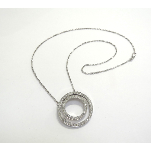 9195 - A double diamond hoop pendant stamped 18k, white gold, 3cm diameter hung on a white gold chain stamp... 