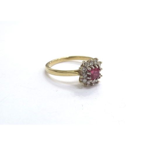 9456 - An 18ct gold ring, centre square cut ruby framed by diamonds, 8mm x 8mm. Size K/L, 2.6g        (E) £... 