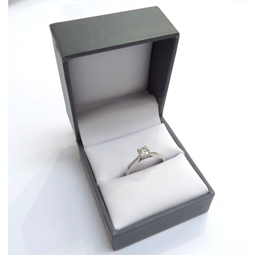 9449 - A 9ct white gold diamond solitaire 0.40ct with diamond set bezel. Size L, 2.2g, with certificate Col... 