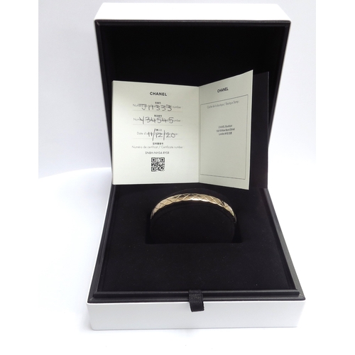 9450 - A Chanel Coco Crush bracelet, 18ct gold quilted design, 6mm width, boxed with Certificate of Authent... 