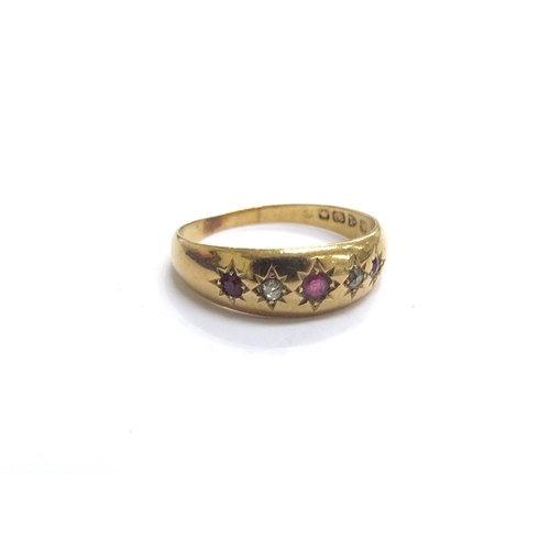 9455 - An 18ct gold five stone diamond and ruby gypsy style ring. Size R, 1.9g