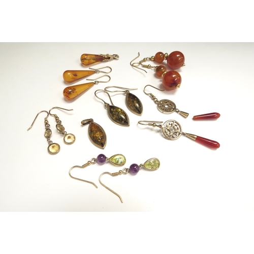 9095 - Six pairs of various earrings including amber, cornelian, two with matching pendants