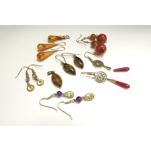 9095 - Six pairs of various earrings including amber, cornelian, two with matching pendants