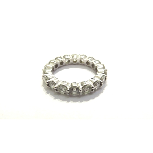 9318 - A diamond full eternity ring, 18 x 0.18ct approx diamonds, unmarked white gold. Size O/P, 6.2g      ... 