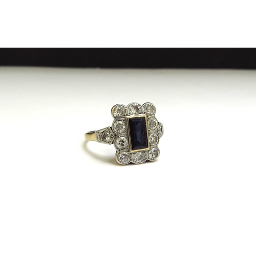 9441 - An 18ct/plat set Art Deco sapphire and diamond ring, the rectangular sapphire 7mm x 4mm framed by 10... 