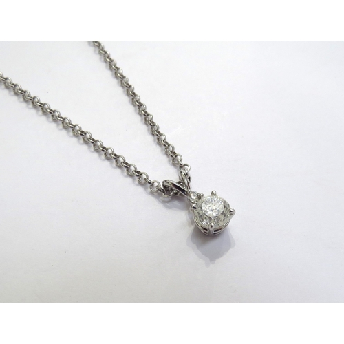 9332 - A two stone diamond drop pendant, one round brilliant cut stone 1.08ct approx in four claws with 0.0... 