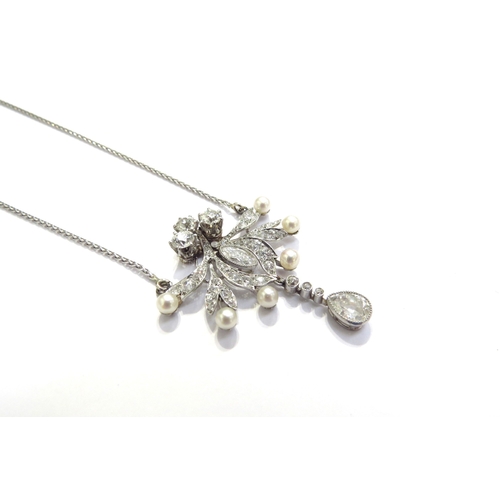 9426 - An early 20th Century diamond and pearl cluster pendant necklace with pear cut diamond droplet 0.50c... 