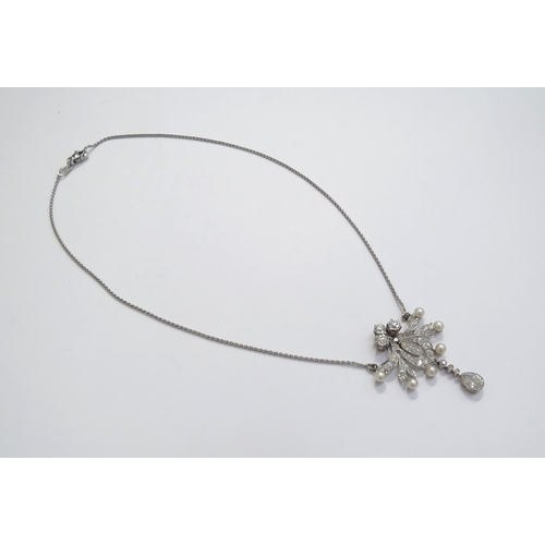 9426 - An early 20th Century diamond and pearl cluster pendant necklace with pear cut diamond droplet 0.50c... 