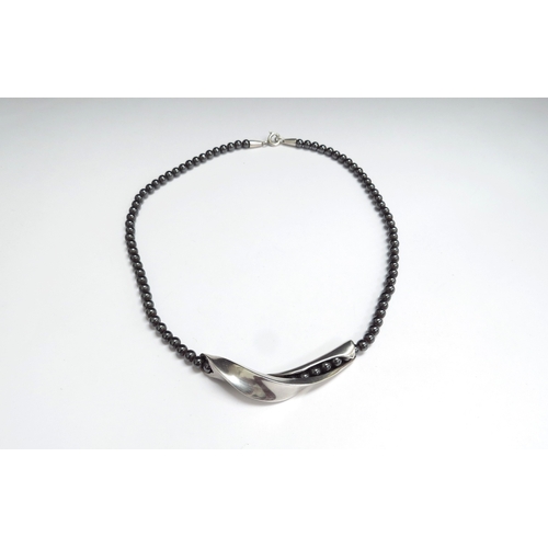 9439 - A Georg Jensen silver and hematite bead necklace by Hans Hanson, boxed, 40cm long       (R) £120