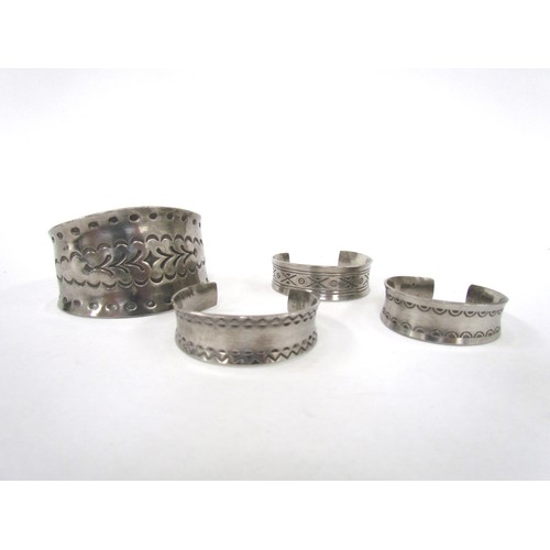 7267 - Four pewter bangles by Jorgen Jensen, Denmark (all marked)