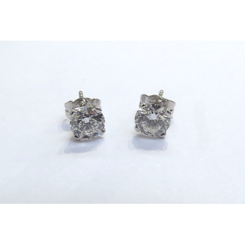 9173 - A pair of diamond stud earrings, each 0.90ct colour F SI2 with receipt and certificates     (R) Next... 