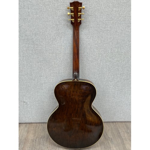 5143 - A Gibson ES125 semi-acoustic guitar, sunburst body, serial no. U213818 to sound hole (U denoted 1957... 
