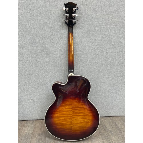 5165 - A Norseman semi-acoustic jazz guitar, sunburst body, raised pickguard with volume and tone knobs, so... 