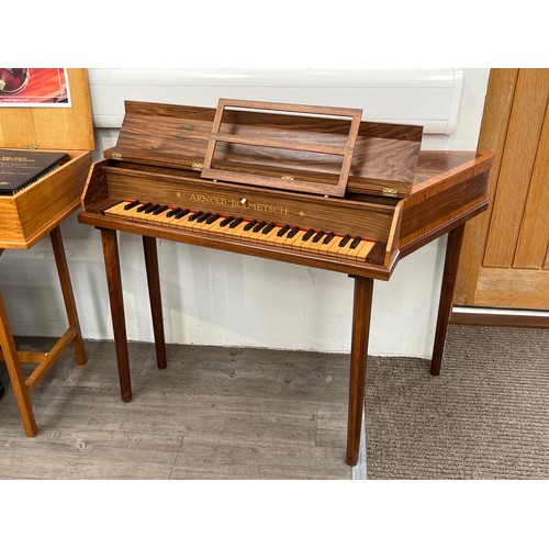 5066 - A Dolmetsch spinet, standard pitch, figured case with satinwood crossbanding