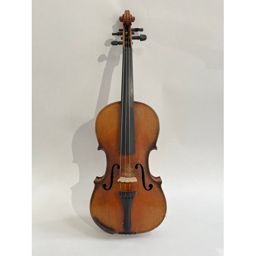5100 - A late 19th / early 20th Century Stradivarius copy violin, full size (4/4), 59cm length, cased