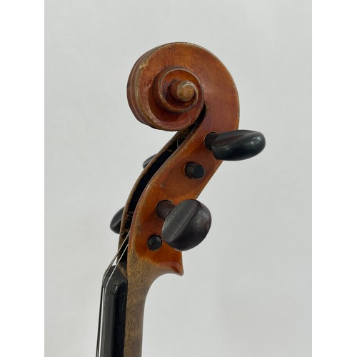 5100 - A late 19th / early 20th Century Stradivarius copy violin, full size (4/4), 59cm length, cased