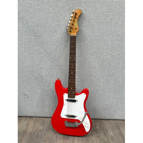 5114 - A 1960's Vox Shadow electric guitar in the Stratocaster style, fiesta red equivalent body, with hard... 