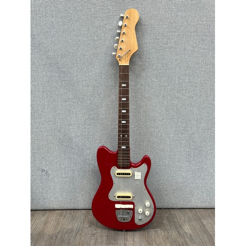 5115 - A 1960's Guyatone electric guitar, thought to be an LG-55, red body, aluminium guard, with hard case... 